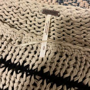 SIZE SMALL. BLACK AND CREAM STRIPPED FREE PEOPLE SWEATER